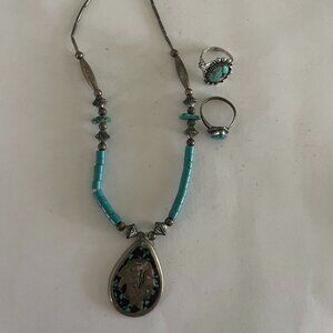 Turquoise colored Necklace with Indian head and 2 rings